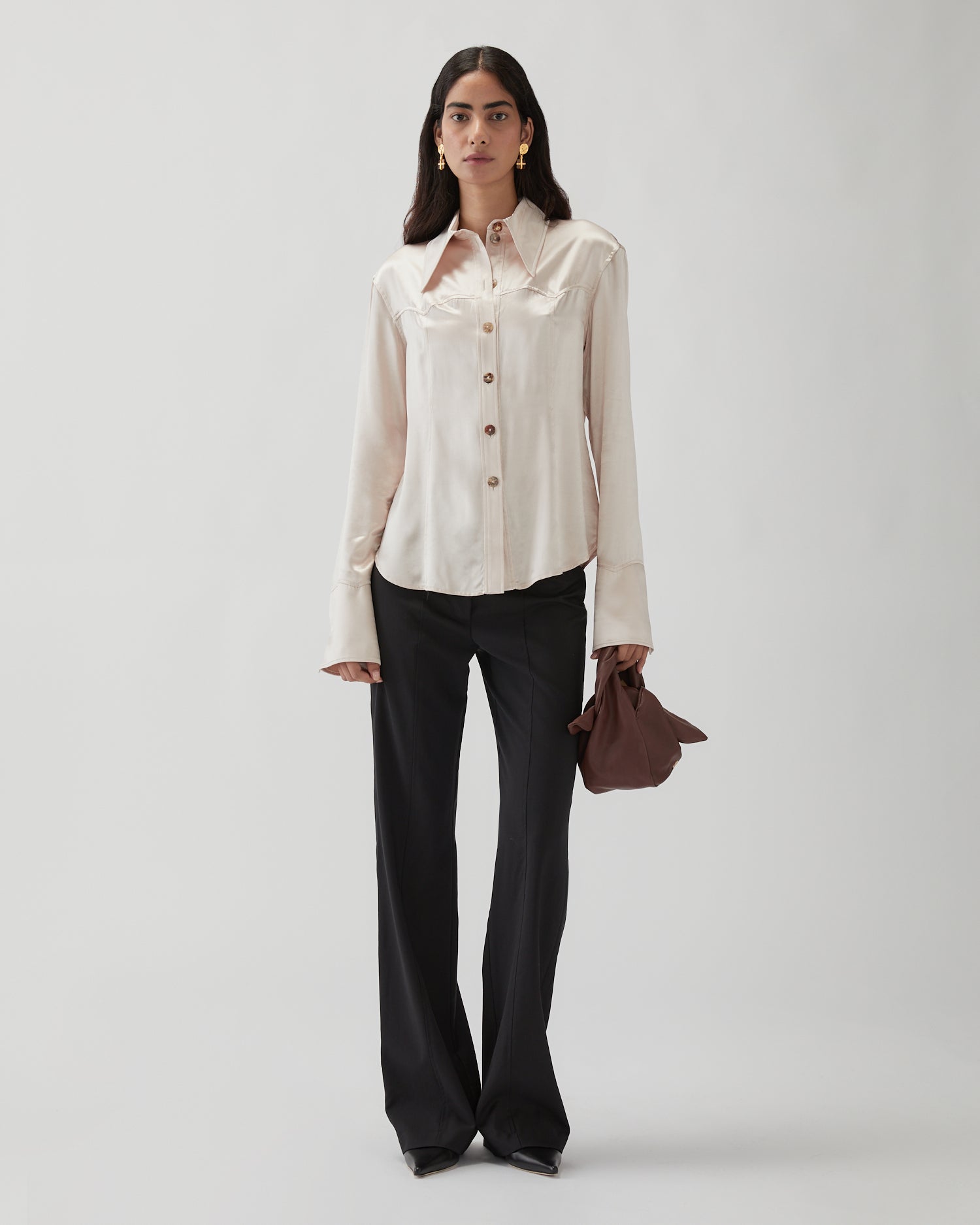 TOPS – REJINA PYO