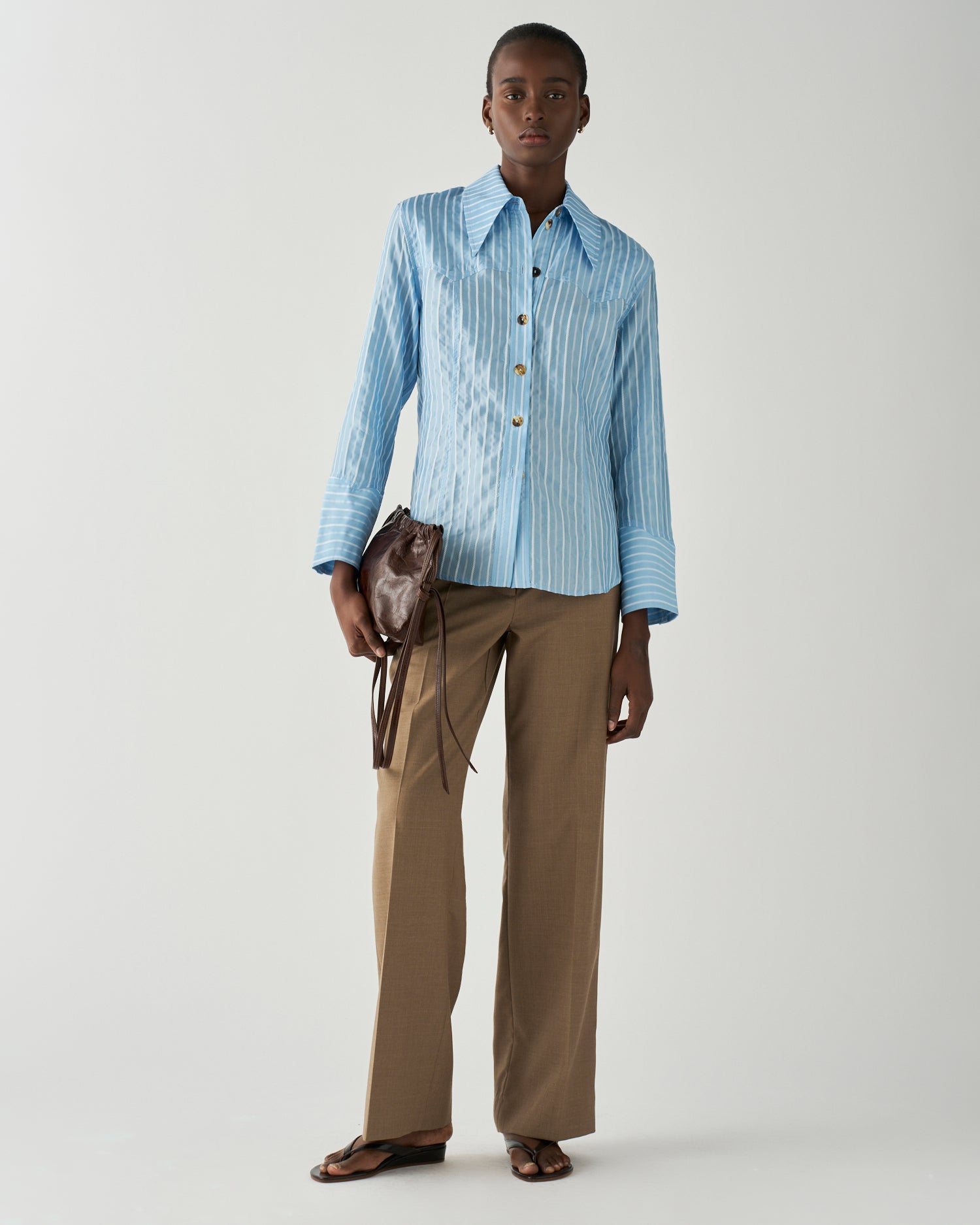 TOPS – REJINA PYO